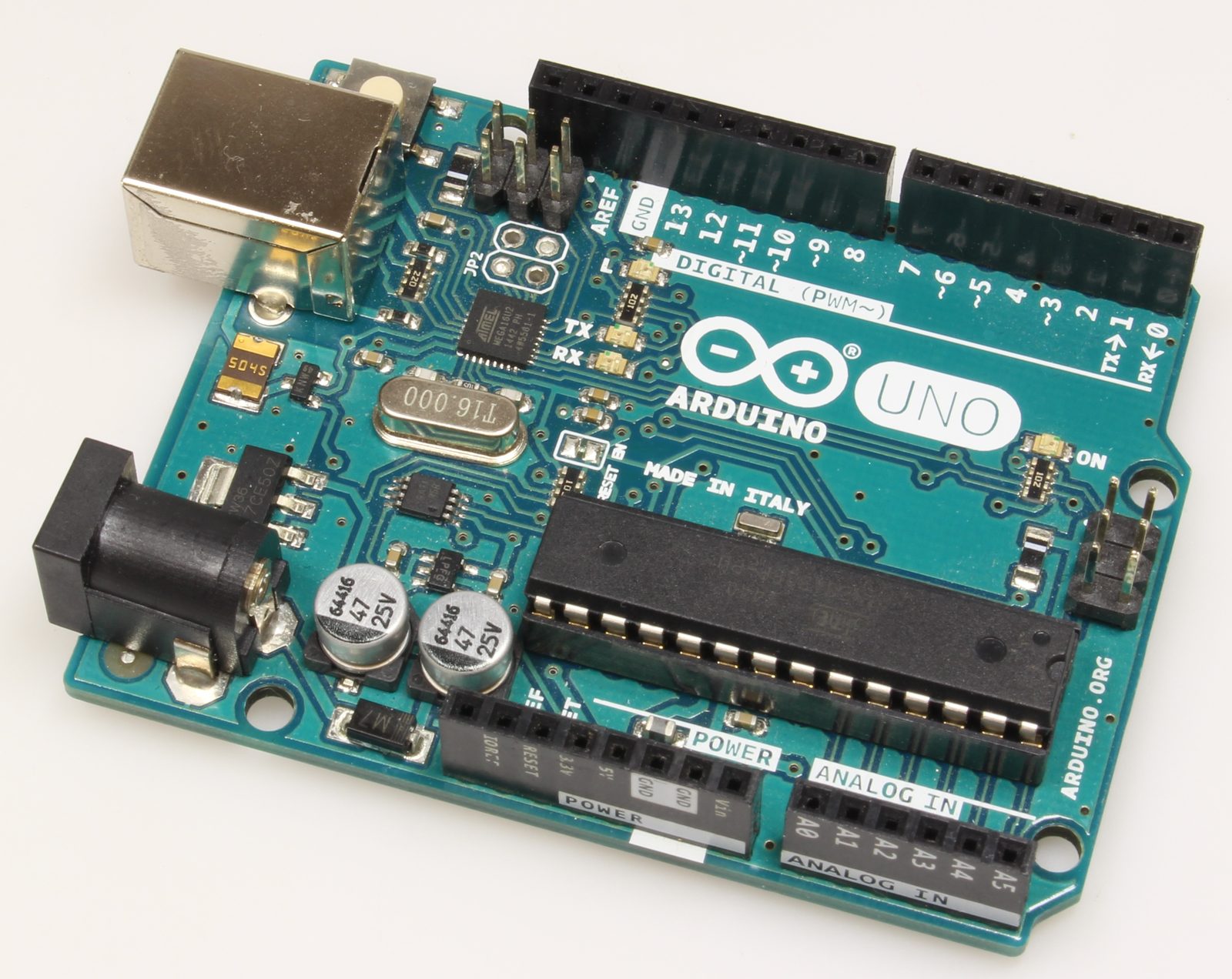 Photograph of an Arduino Uno R3 board, showing its microcontroller, headers and USB connector.